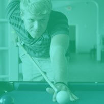 College student playing pool
